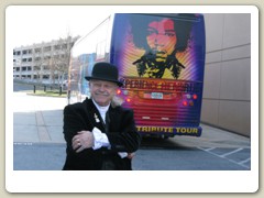 Dr. Bob by the back of the 2012 Experience Hendrix tour bus